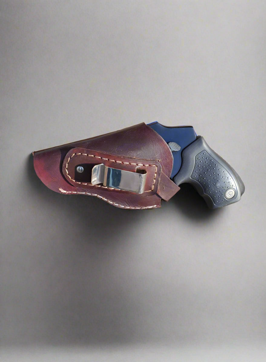 Hammerless .38 steel clip mount holster