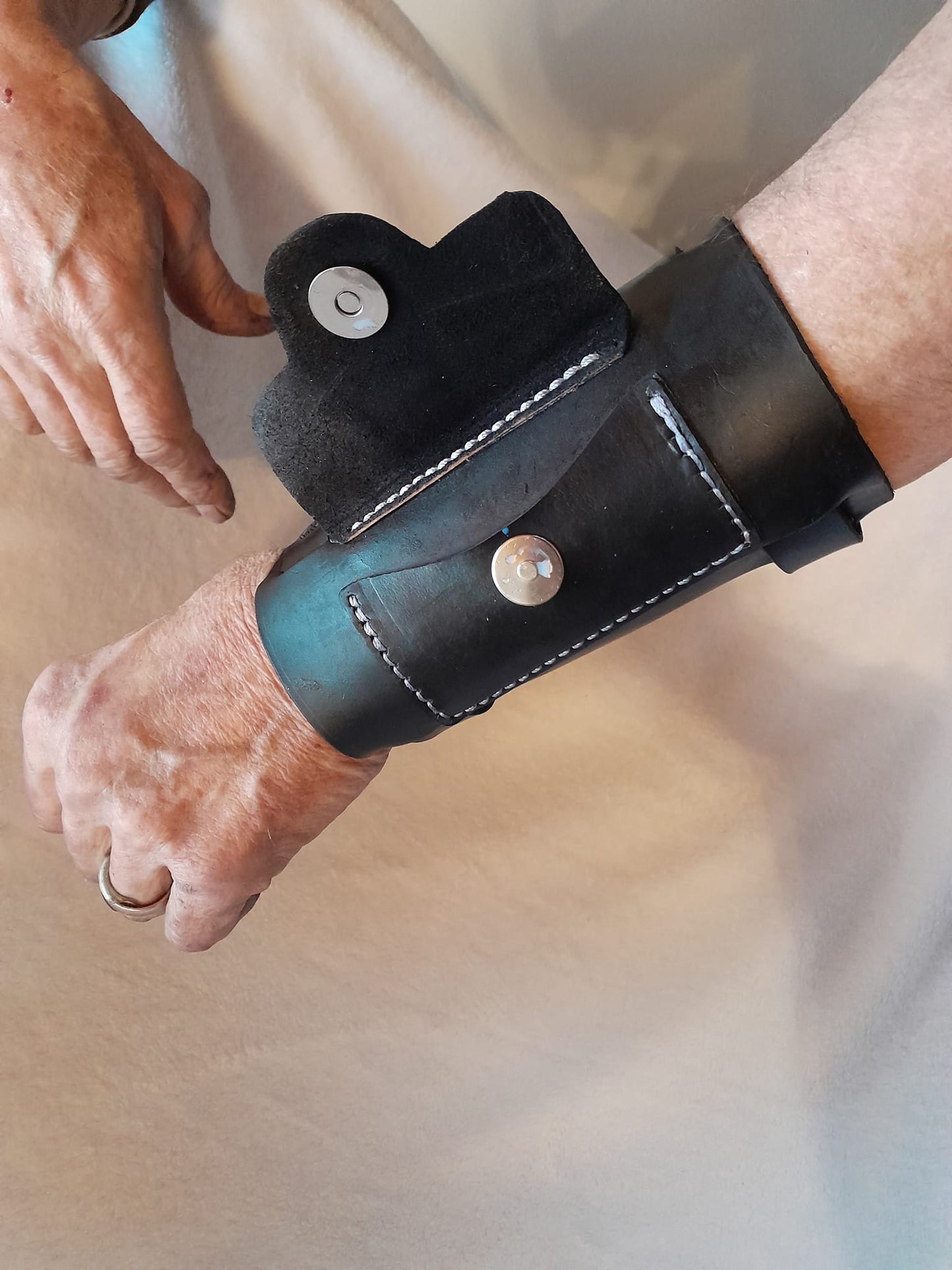 Handmade Leather Bracer Wrist Cuff Blacksmith Style Wristband with Pocket. 6" wide 7 1/2" long at the wrist diameter with three 3/4" buckle bands.