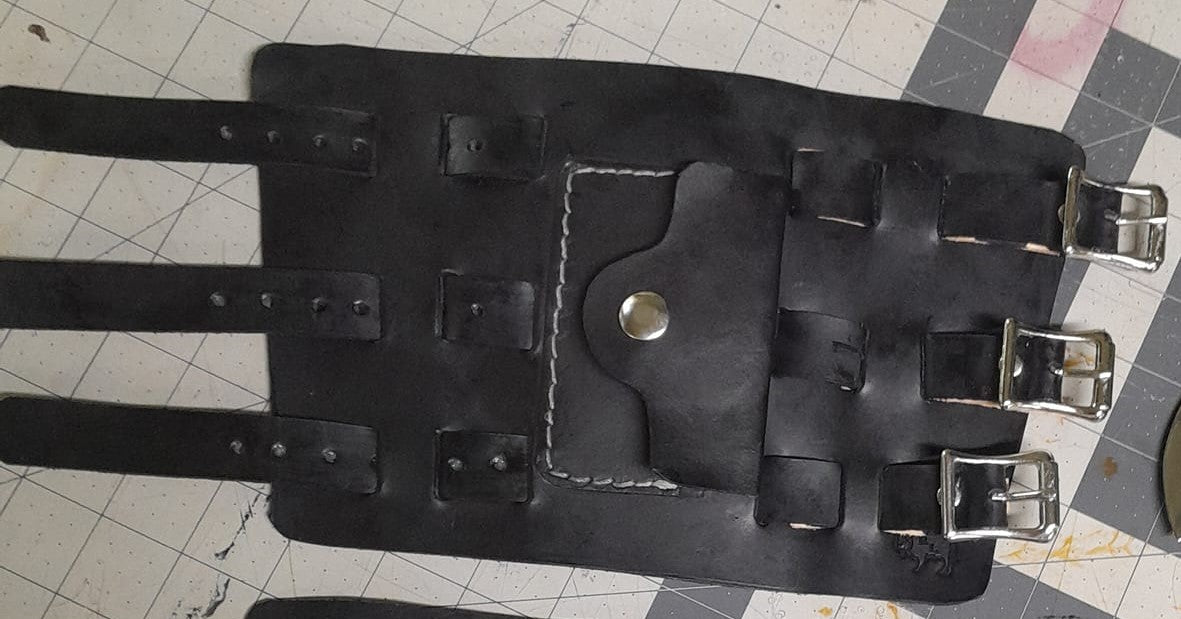 Handmade Leather Bracer Wrist Cuff Blacksmith Style Wristband with Pocket. 6" wide 7 1/2" long at the wrist diameter with three 3/4" buckle bands.