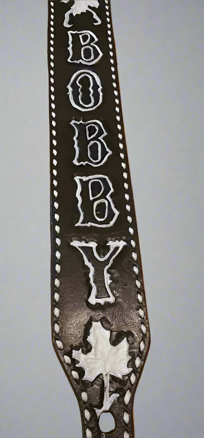 The Ultimate, padded, any width, any length and engraved leather guitar / bass strap.