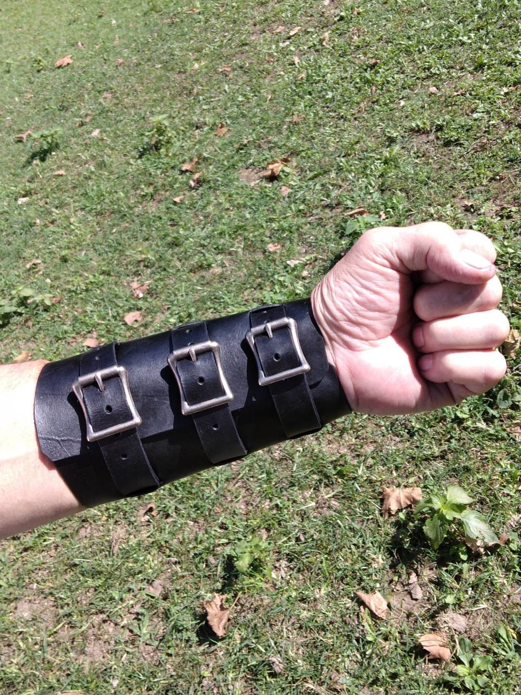 Handmade Leather Bracer Wrist Cuff Blacksmith Style Wristband with Pocket. 6" wide 7 1/2" long at the wrist diameter with three 3/4" buckle bands.
