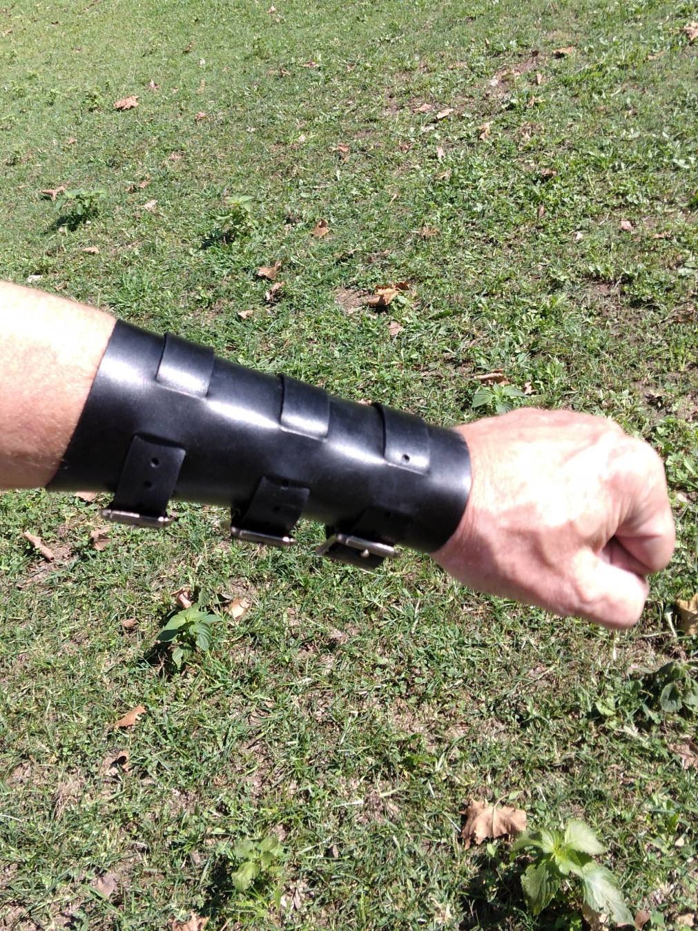 Handmade Leather Bracer Wrist Cuff Blacksmith Style Wristband with Pocket. 6" wide 7 1/2" long at the wrist diameter with three 3/4" buckle bands.