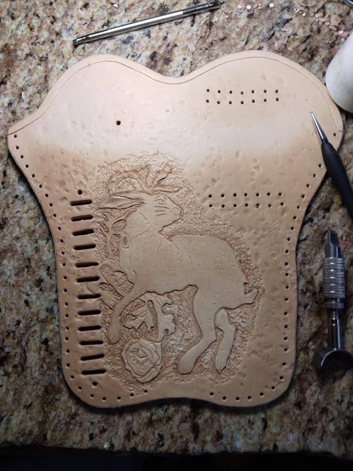 Handmade for left hand use. Freehand engraved and monogrammed, pistol holster for auto-loader or revolver.