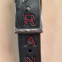 The Ultimate, padded, any width, any length and engraved leather guitar / bass strap.