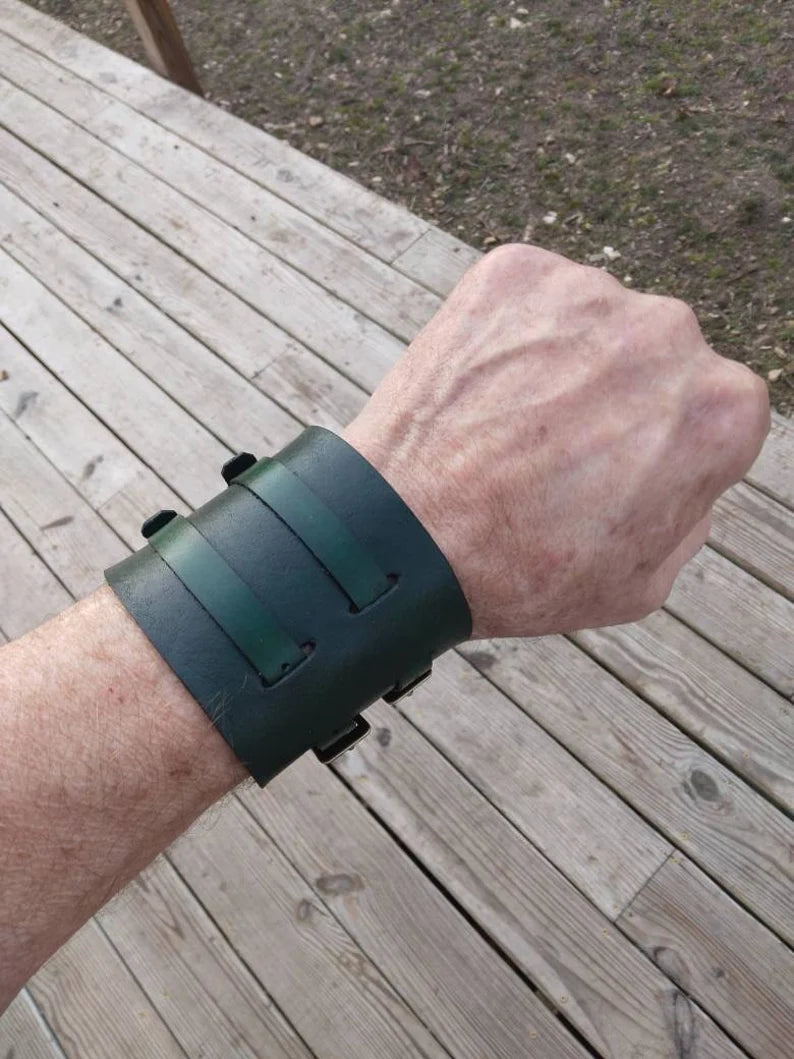 Handmade Leather Bracer Wrist Cuff Blacksmith Style Wristband. 5" wide 7 1/2" long at the wrist diameter with two 3/4" buckle bands. The Rumblefish.