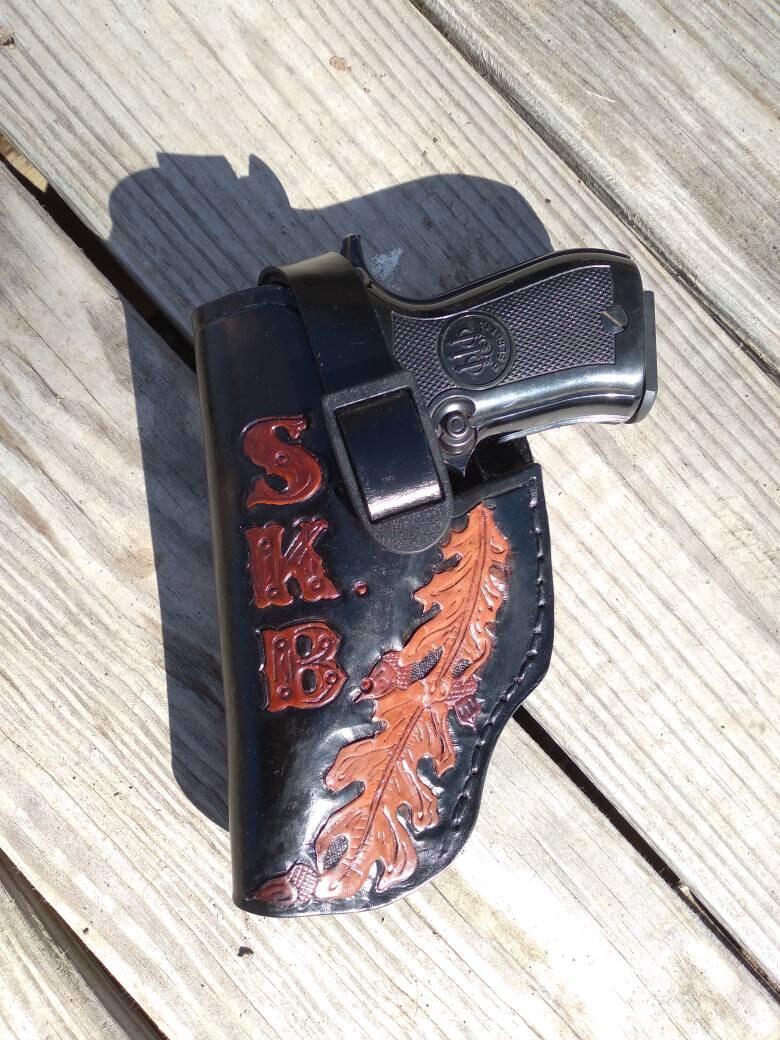 holster for revolver or automatic pistol