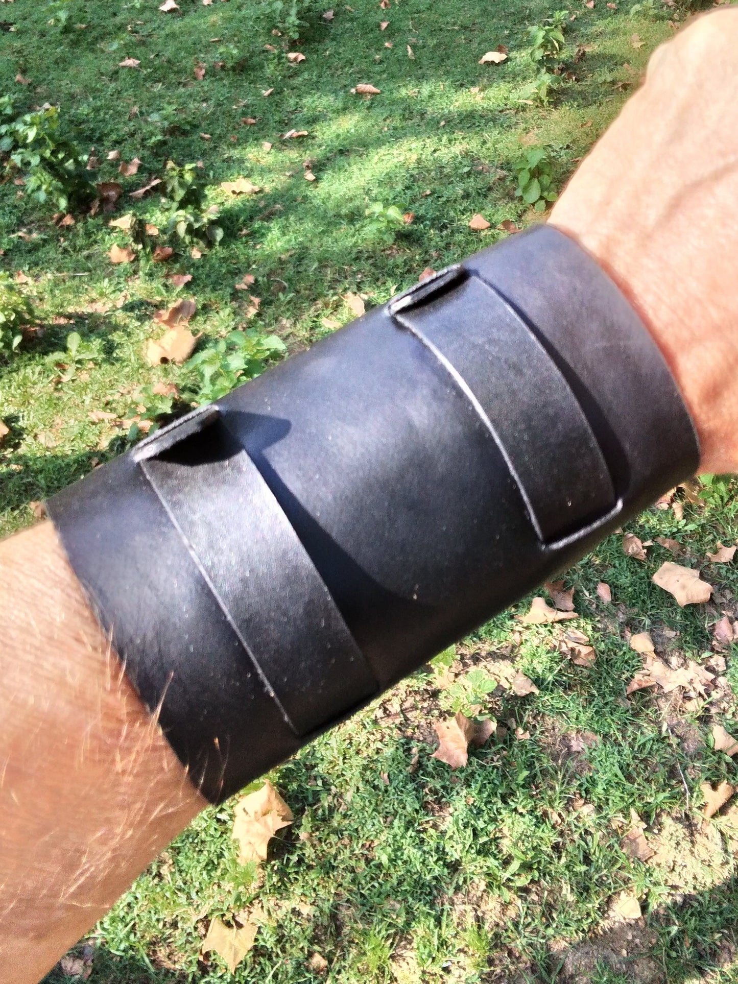 Handmade Leather Bracer Wrist Cuff Blacksmith Style Wristband. 5" wide 7 1/2" long at the wrist diameter with two 3/4" buckle bands. The Rumblefish.